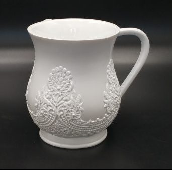 נטלה פוליאסטר - פנינה לבנה פיתוחים מעוטרת